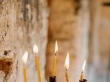 burning candles at praying place in church